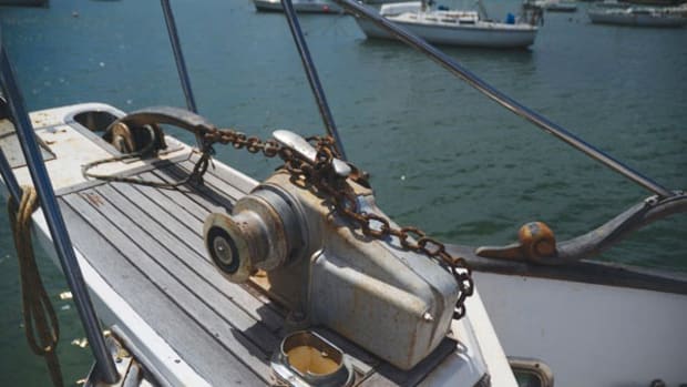 This old windlass has fought its battles and is ready for retirement.