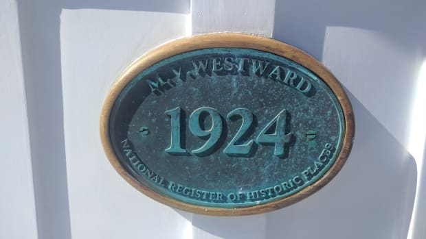 Placard designating the MV Westward as a historic place, designated by the National Parks Service.