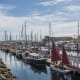 The basin adjacent to the Northwest Maritime Center hosts the entire Wooden Boat Festival, and features exhibitor tents surrounding the in-water show, as well as demonstrations inside the facility's training spaces. Visit NWMC for more.