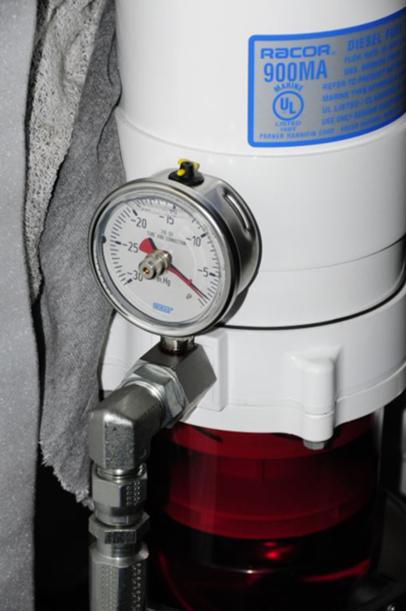 Permanently installing vacuum gauges on filter outlet plumbing, reduces the likelihood of damage and allows the filter’s T-handle to remain in place.