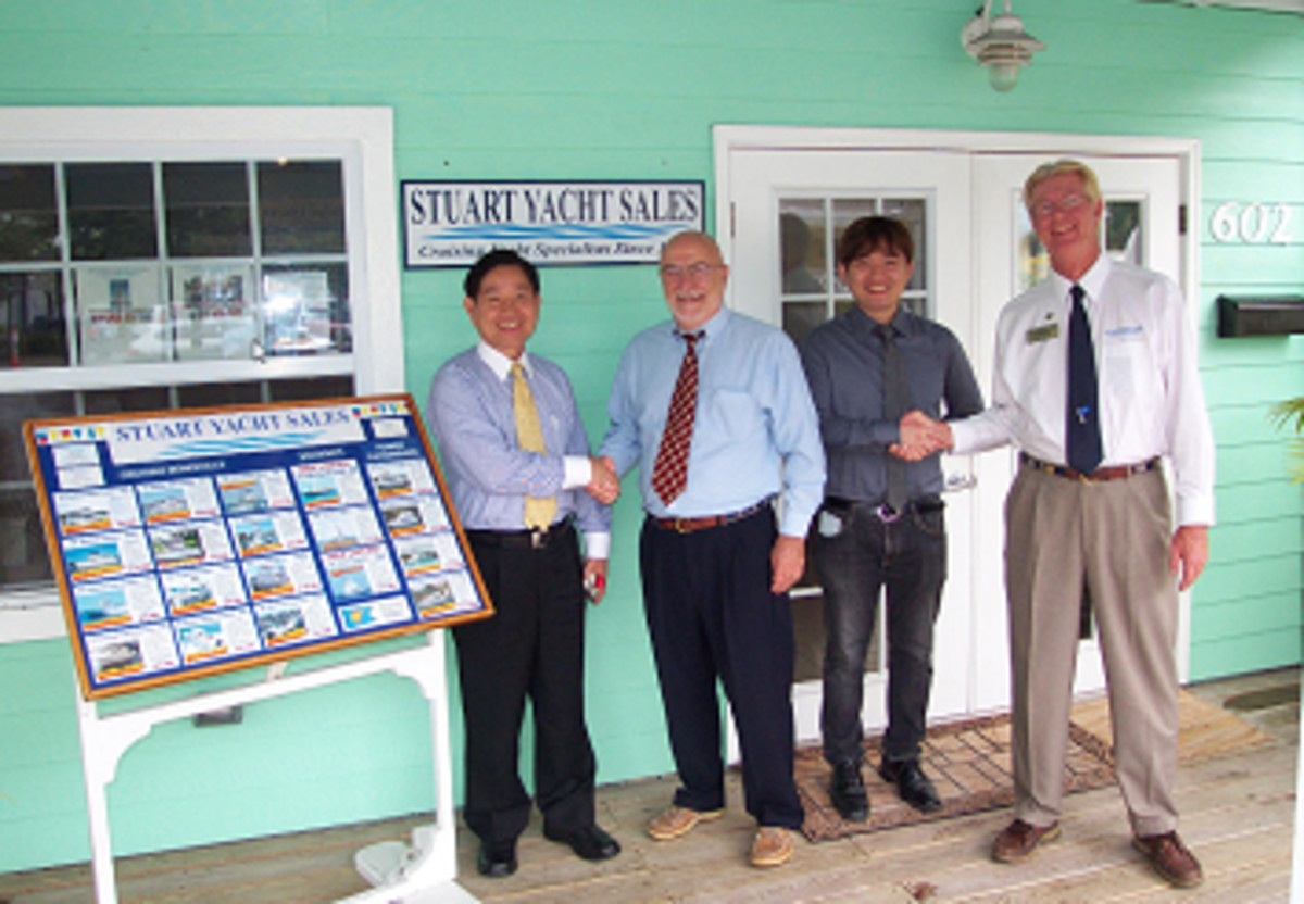 Left to Right: Wilson Lin, president of POCTA International; Andy Andreoli, broker for Stuart Yacht Sales, Louis Lin of POCTA and Bill Watson, president of Stuart Yacht Sales.