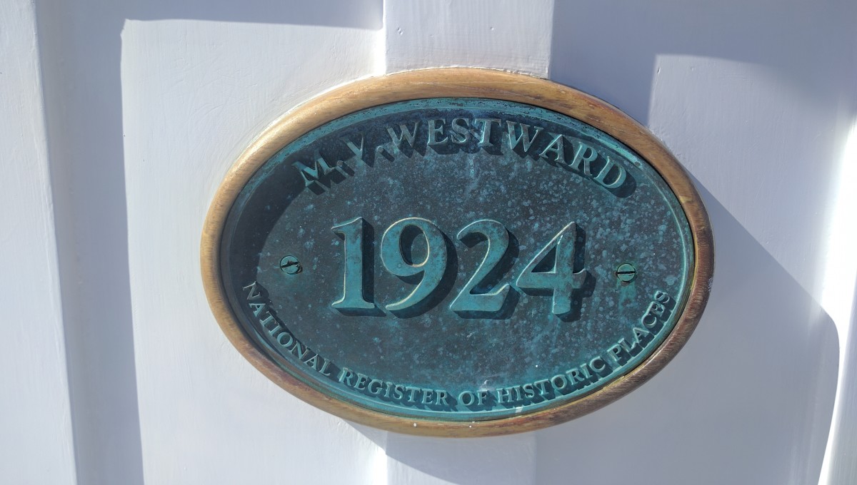 Placard designating the MV Westward as a historic place, designated by the National Parks Service.