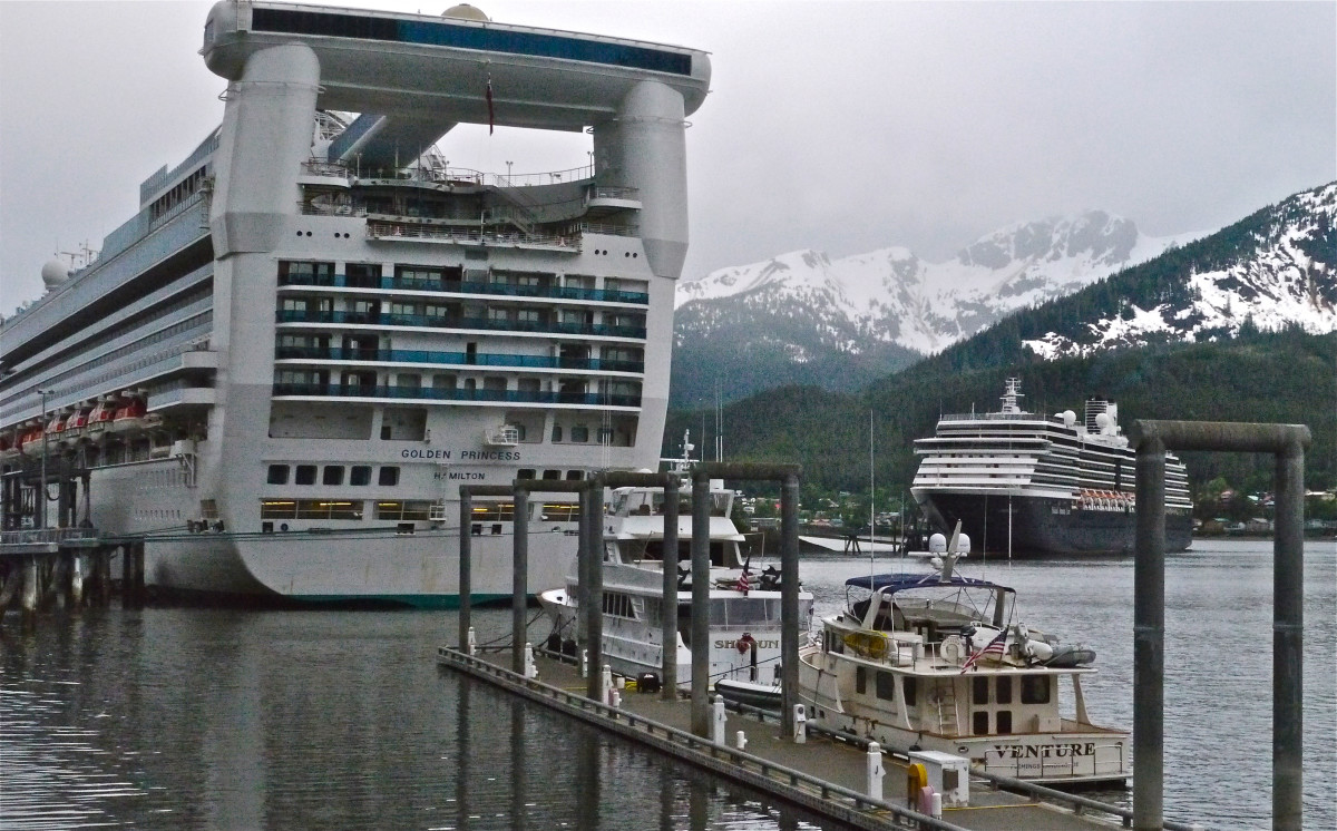 Here Venture is dwarfed by a massive cruise ship in Juneau.