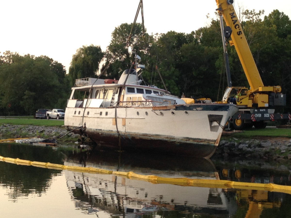  The Notorious is lifted by crane in front of Ditto Landing. (Photo By: Christine Killimayer/WHNT News 19)