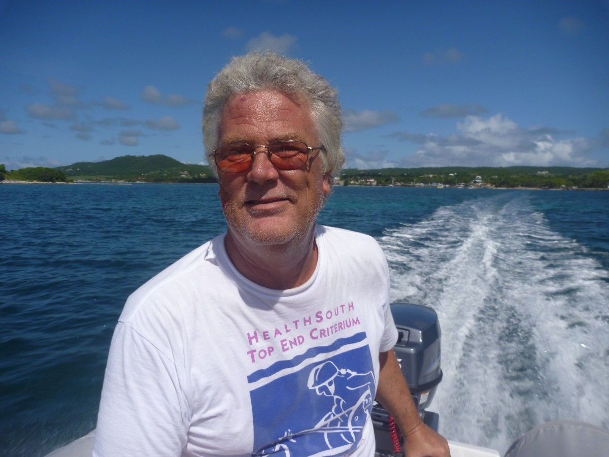 The Captain at the tiller of his beloved go-fast dinghy. We quickly made the two mile trip from the Sun Bay anchorage to visit the town of Esperanza. We still couldn't keep up with the flying fish scooting along above the surface.