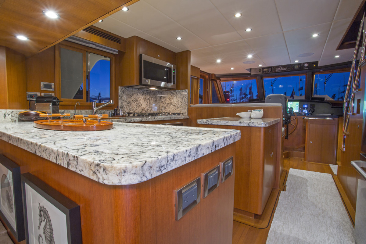 Rare in a yacht this size, the U-shape galley with full-size appliances is large enough for plenty of cook and prep space.