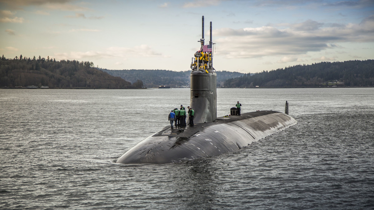 The Seawolf-class fast-attack submarine USS Connecticut (SSN 22) departs Puget Sound Naval Shipyard for sea trials following a maintenance availability.