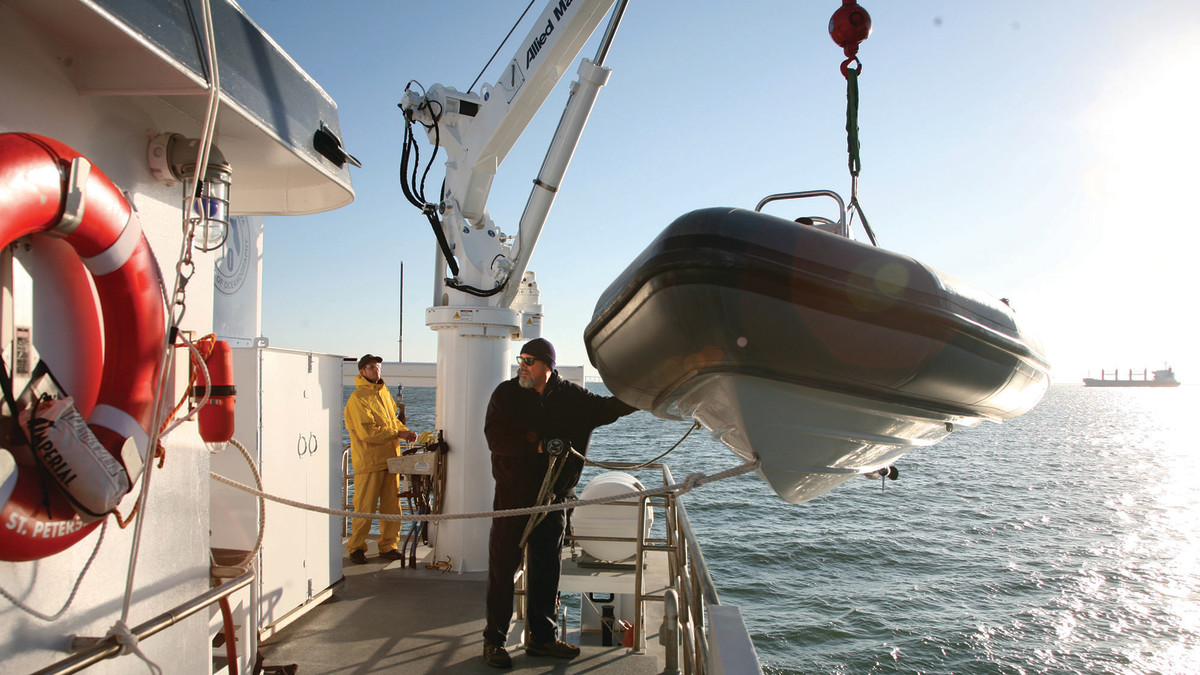 Captain Coy helps launch the RIB.