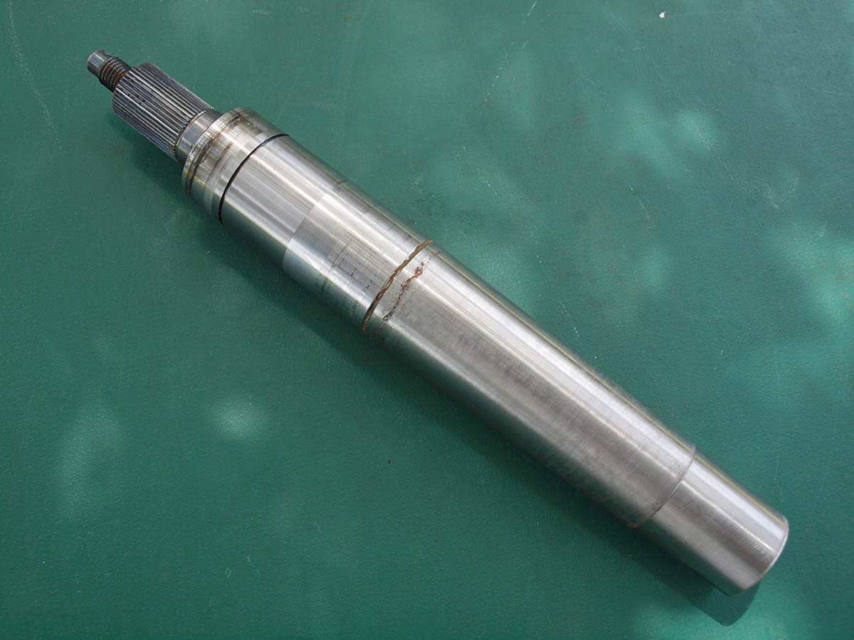 This fin stabilizer shaft has been damaged from failure to replace the outer seal. When the seal fails, seawater enters the bearing assembly, diluting the lubricant and causing corrosion on the shaft.