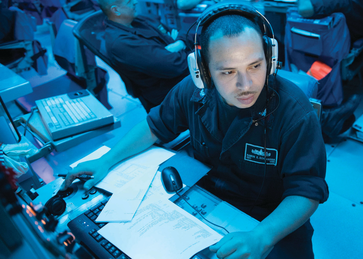 This is the combat information center on a U.S. Navy ship, bathed in blueish light. And although these sailors in the belowdecks CIC would not be expected to go outside and scan the horizon for other shipping, the image does demonstrate the current lighting practices. 