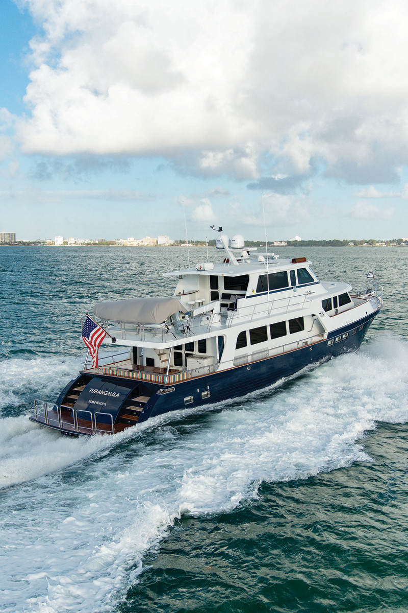 Photo of the aft displays the 75E’s immense social space and convenient access to the swim platform.