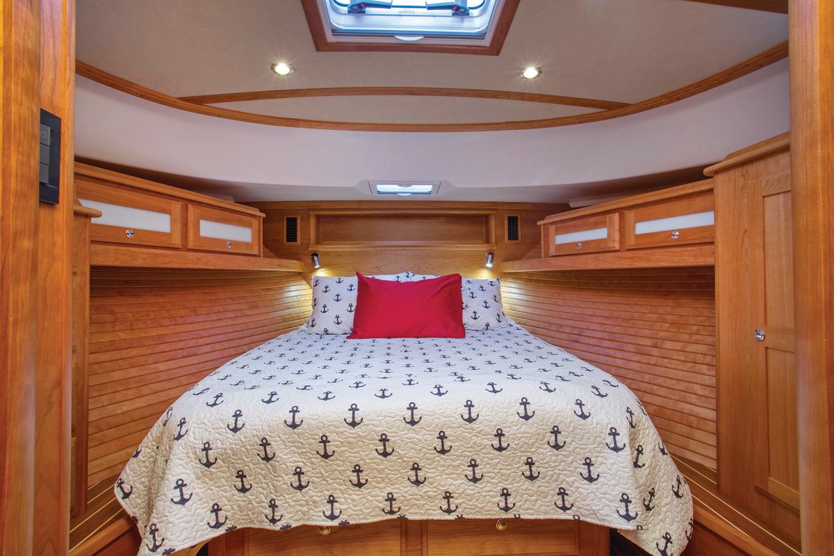 The forward master cabin is light and bright thanks to the use of cherry wood.