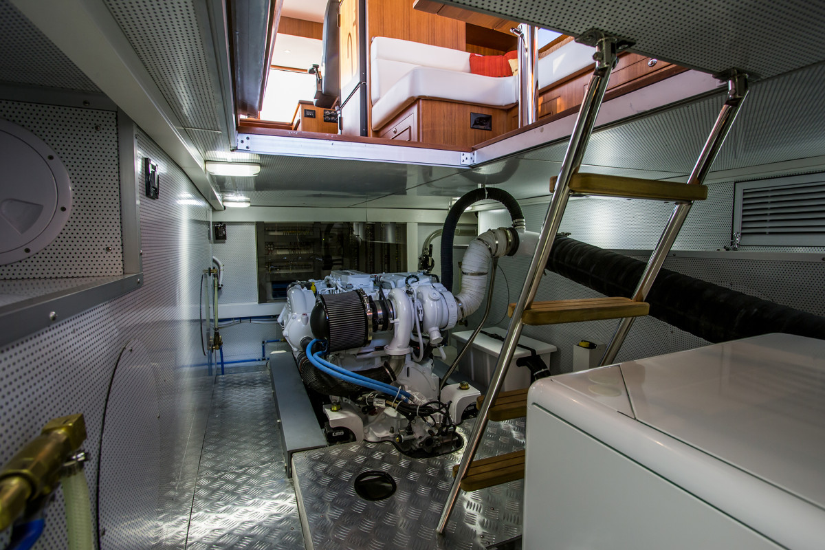 The engine room, which can be found under the saloon floor, is spacious, spotless, and well laid out.