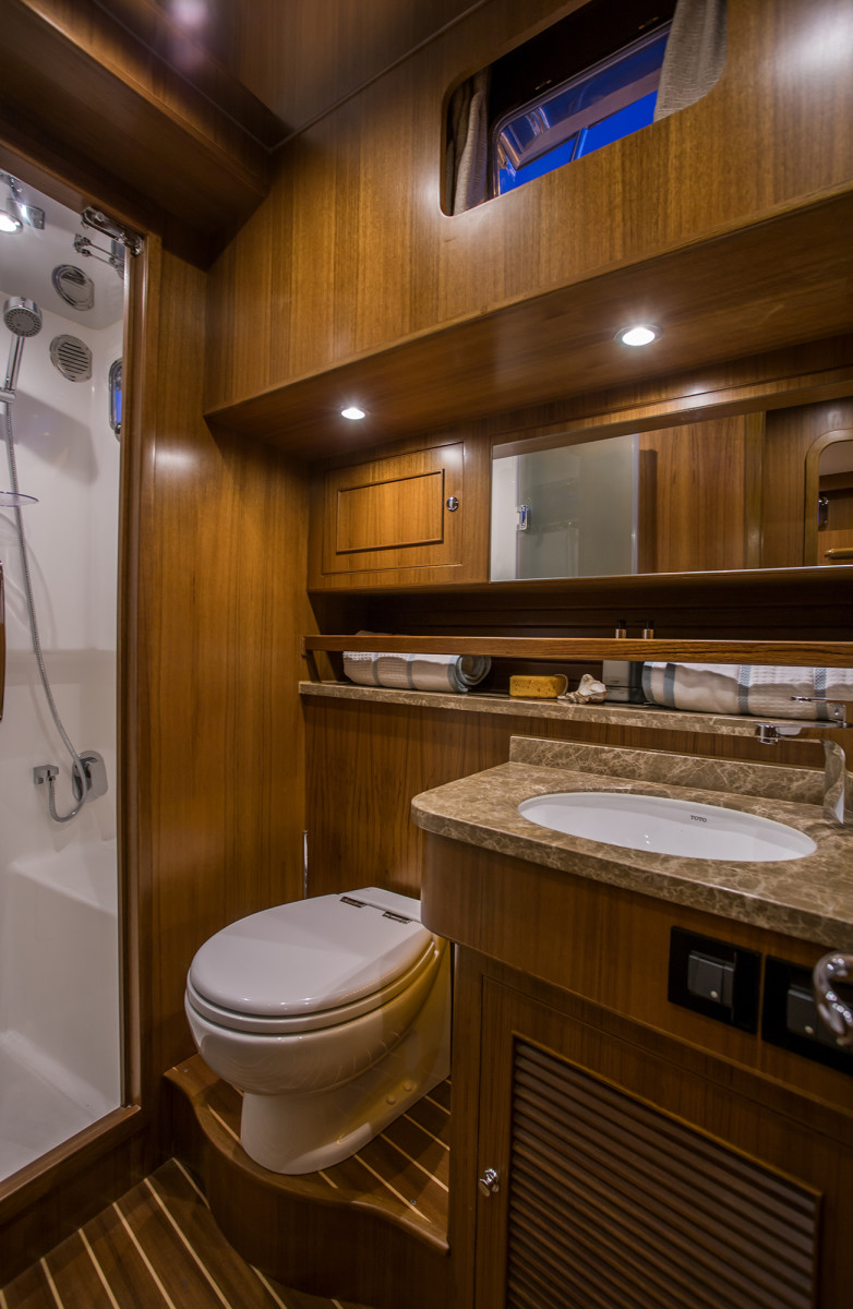 The spacious head allows access both from the companionway and the master stateroom.