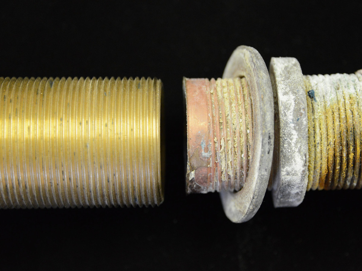 The pink hue on the right points to a condition referred to as ‘dezincification.’ Pink indicates the loss of zinc from the alloy, leaving behind a porous and weakened part.