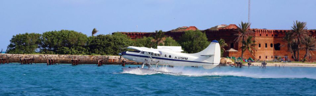 Seaplanes full of tourists take off and land all day long in Garden Key.