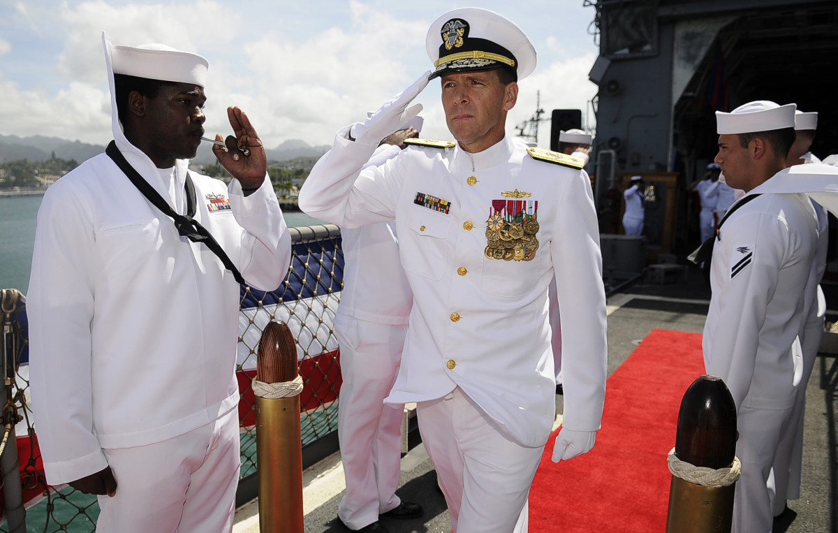 US_Navy_110317-N-WP746-247_Rear_Adm._Dixon_Smith,_commander_of_Naval_Surface_Group,_Middle_Pacific,_salutes_as_he_exits_a_change_of_command_ceremon