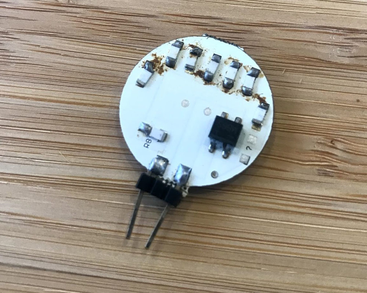 The backside of the cheap LED bulb. Notice the much simpler circuitry than the constant voltage drivers.