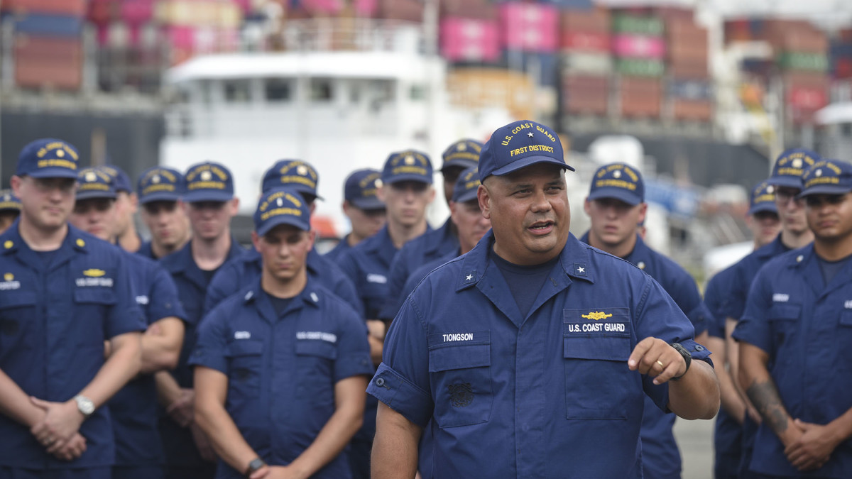 USCG Rear Admiral Andrew J Tiongson, commander , First Coast Guard District speaks with crew members from various USCG cutters that serve in the Northeastern United States.