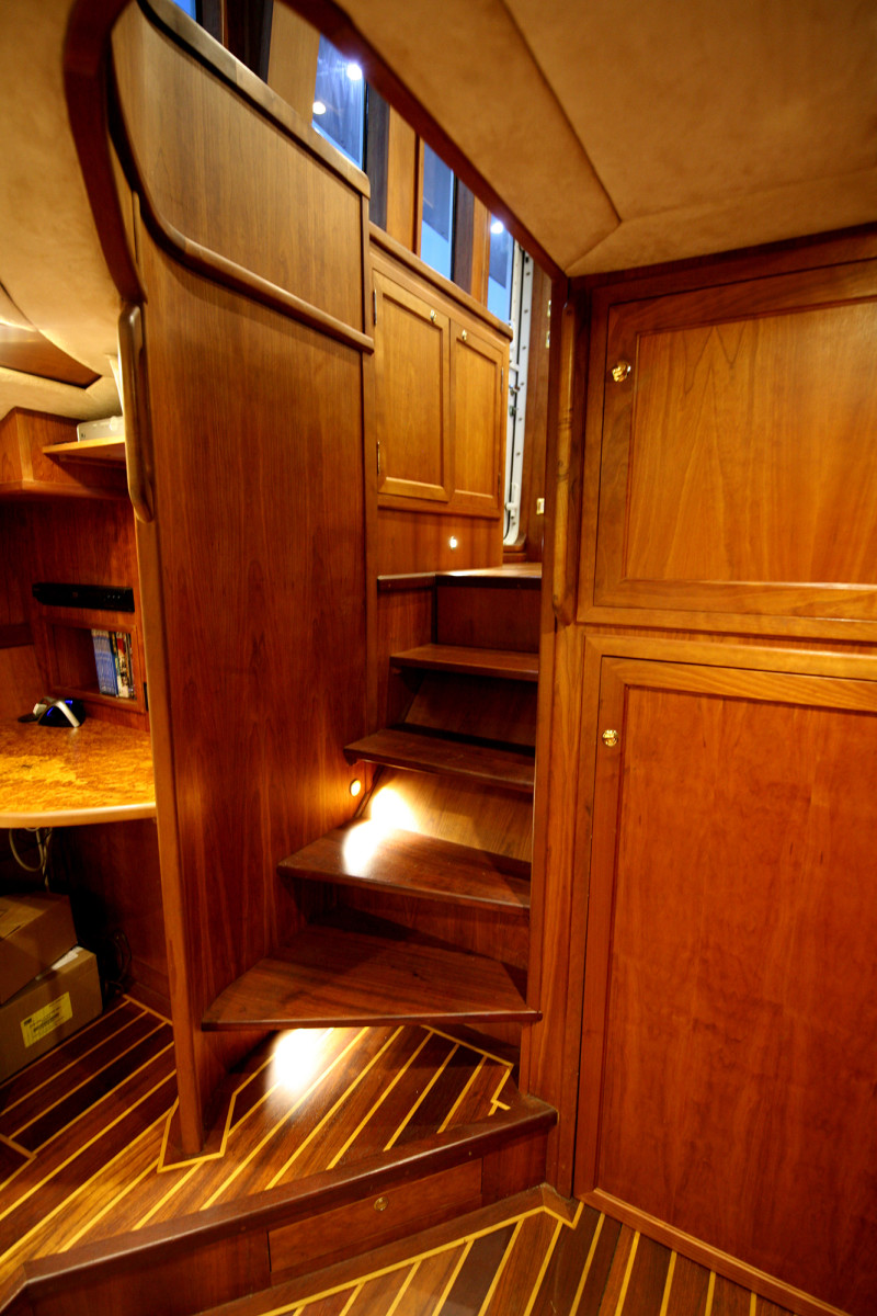 The view from the master stateroom shows the consistency of detail throughout the custom cabinetry, all finished in natural cherry. 