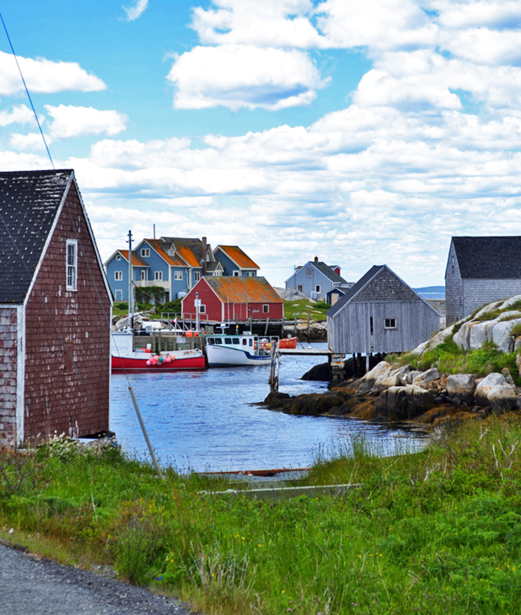 Few places on earth match the sleepy, picturesque fishing village of Peggy’s Cove in Nova Scotia, where you can slice the area’s traditional workboat influence with a butter knife. 