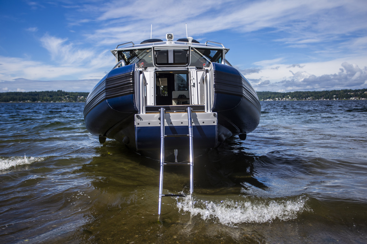The drop bow door, a signature feature of the Full Cabin line, allows for easy unloading when beaching the boat.