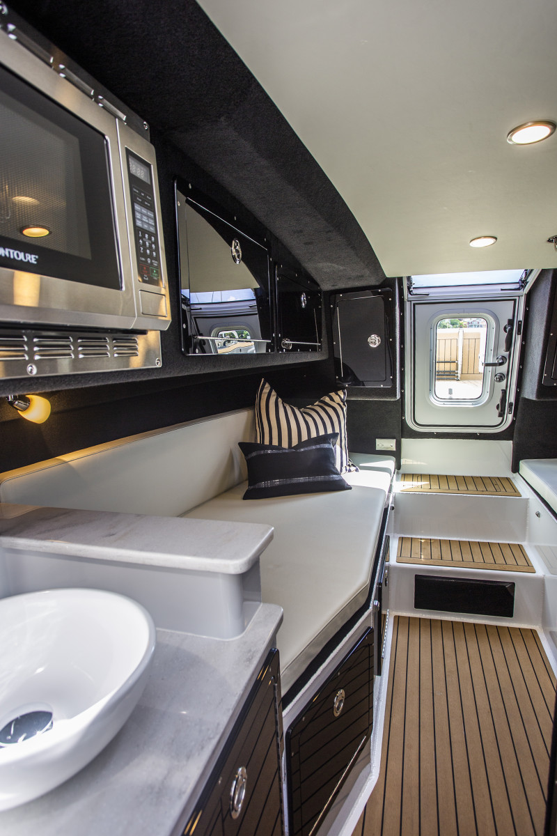 Plenty of room for R&R in the lower cabin, which has two berths, a stand-up head with a shower, a sink, a microwave, bow access and loads of stowage.