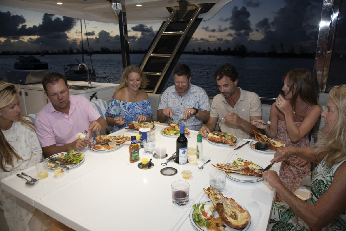 Our crew enjoying an Anegada lobster feast on the flybridge