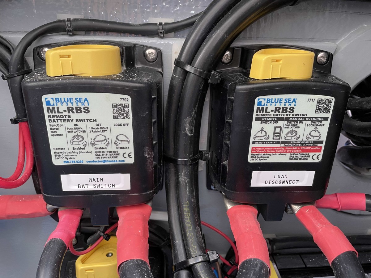 Remote-control battery switches can be installed close to the battery, so no one has to reach into the engine room to operate them. The yellow lever can be used to manually operate the switch.