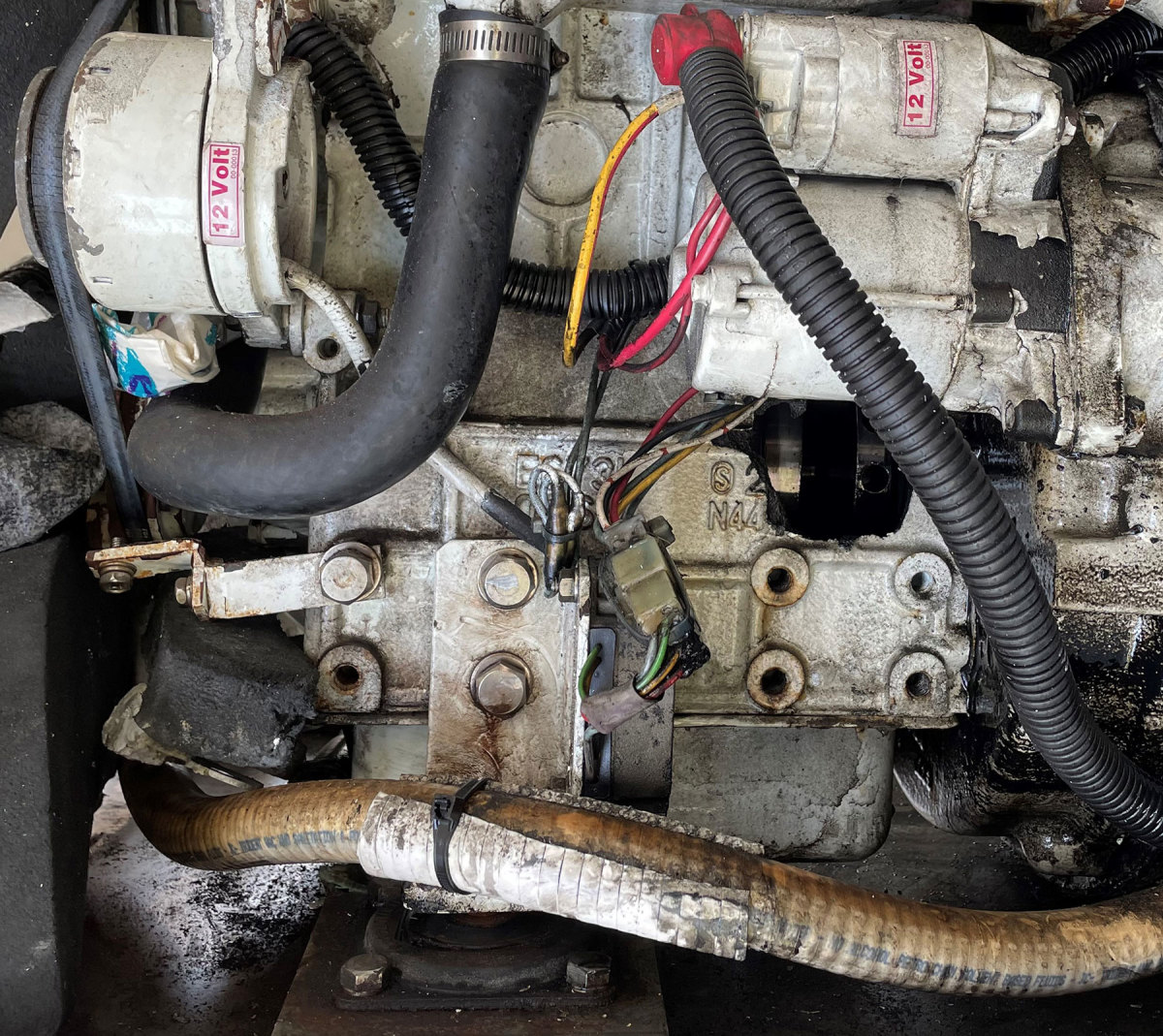 This generator met an early demise. Perpetual low oil and a bypassed alarm system starved bearings, causing a broken connecting rod to break a hole in the block.