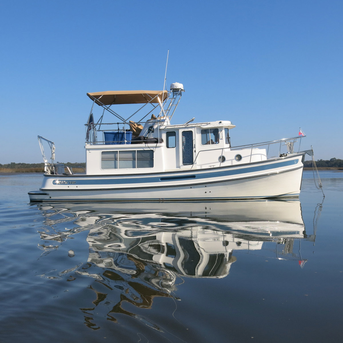 LOA 34’11”  Beam 11’4”  Draft 3’8”  Displacement 15,700 lbs.  Speed 12 to 14 knots   Brokerage price $249,900 to $379,900