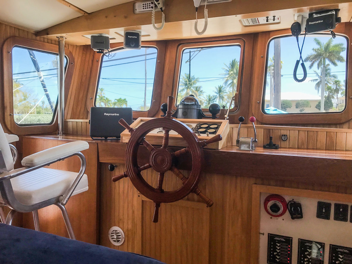 The new steel deckhouse, which Bob built himself, is home to the helm and a comfortable salon.