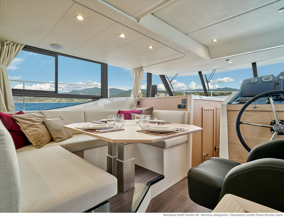 The salon is bright and airy, an ideal spot to pass time while cruising.