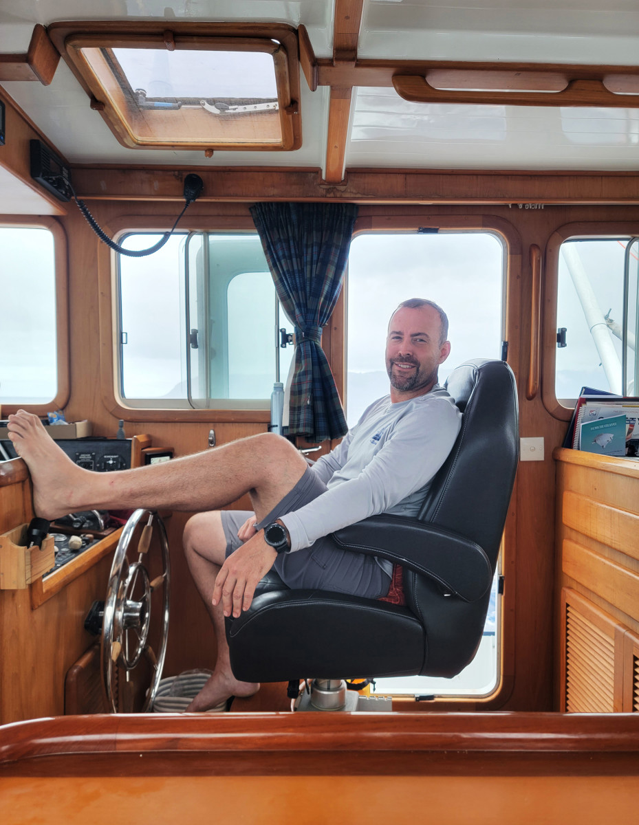 Dwayne relaxes at the helm.