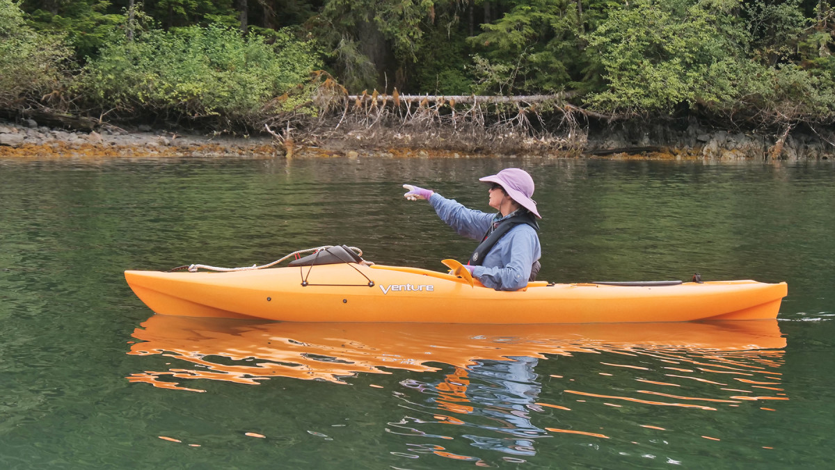 Crewmember Christine Edwards in the kayak on a nature paddle.