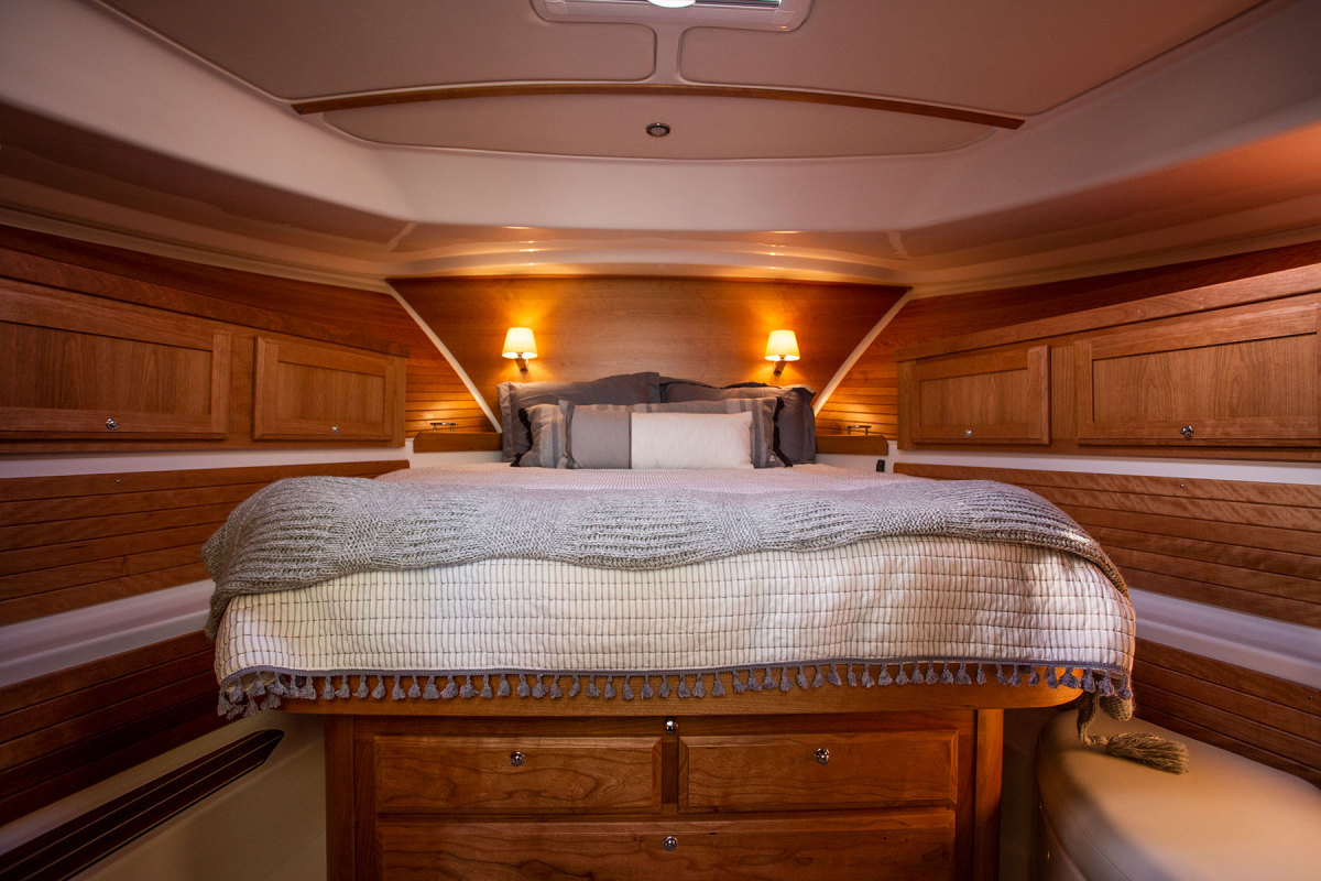 The master stateroom has just the right amount of cherry to feel welcoming, yet unufussy. A second stateroom to starboard sleeps two. 