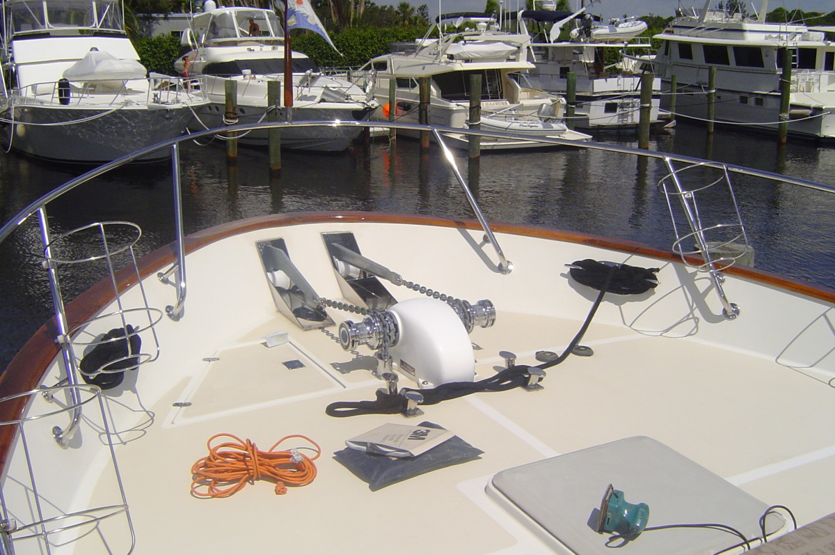 A dual anchor setup utilizing a double-sided, single windlass, each with its own capstan and gypsy