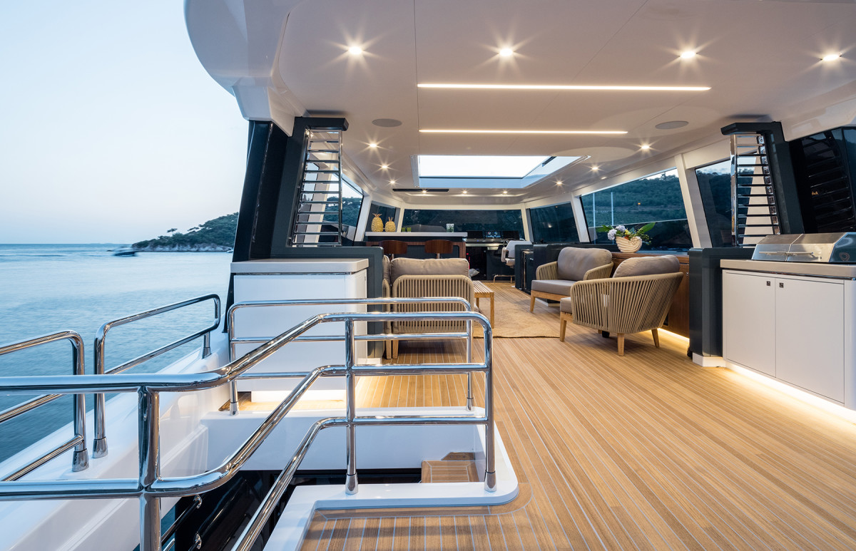 The flybridge has freestanding furniture and a number of available seating options. 