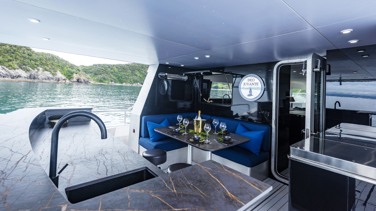 The covered aft deck has a large, functional galley, as well as alfresco entertainment space.  